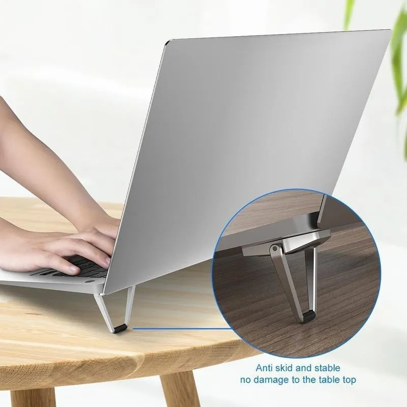 Foldable aluminium laptop bracket in silver with 3M adhesive strips