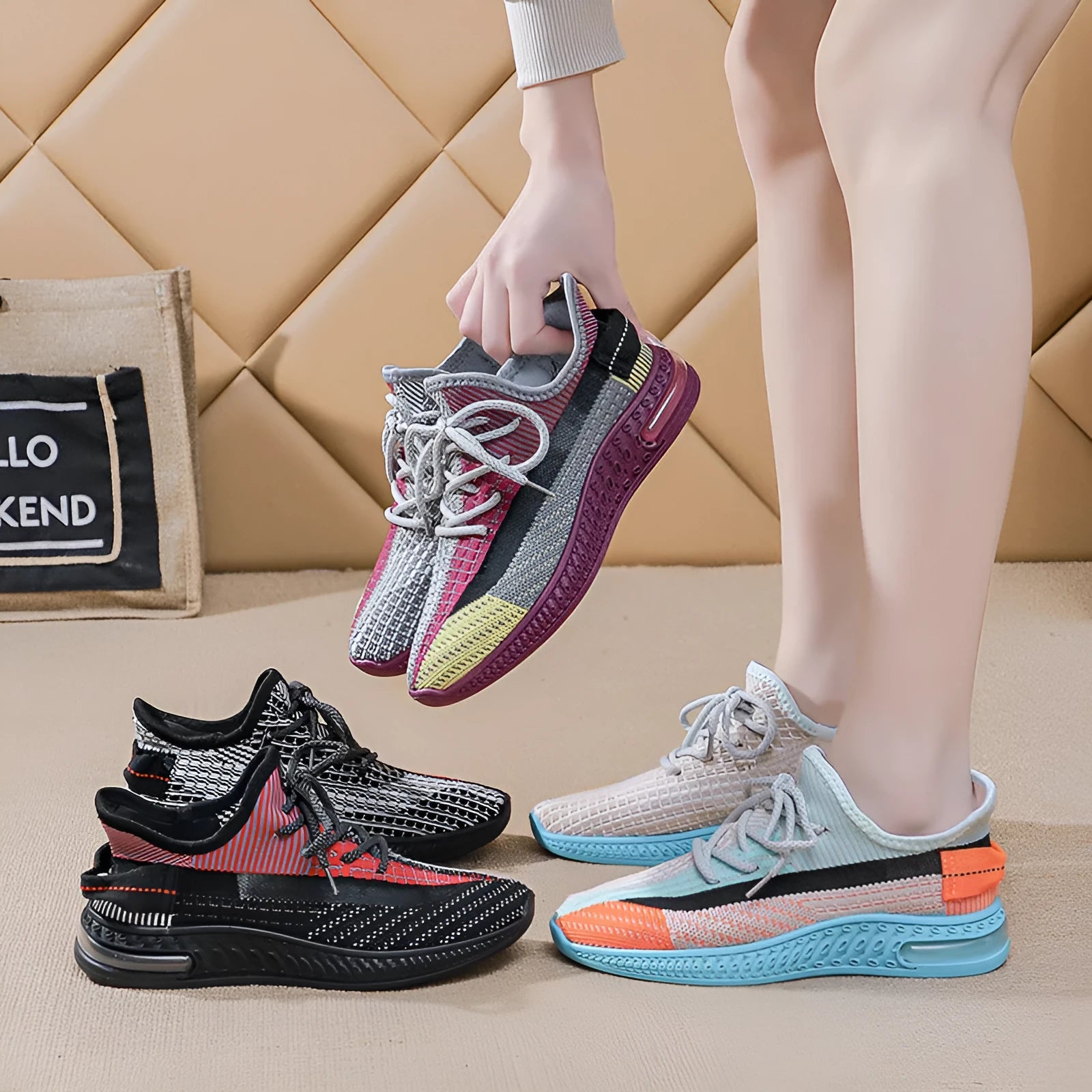 Women's lightweight casual running shoes in purple, black and orange colours with front lace-up design