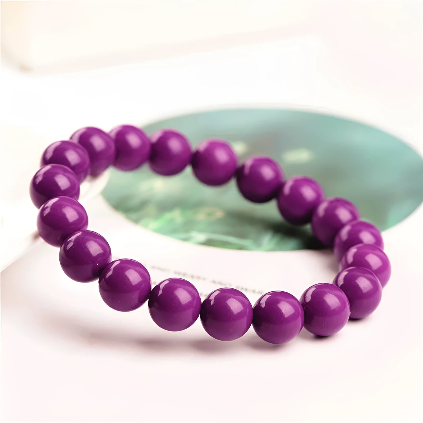 Jiuya purple mica crystal bracelet showing polished beads in a single circle, demonstrating 5A grade colour.