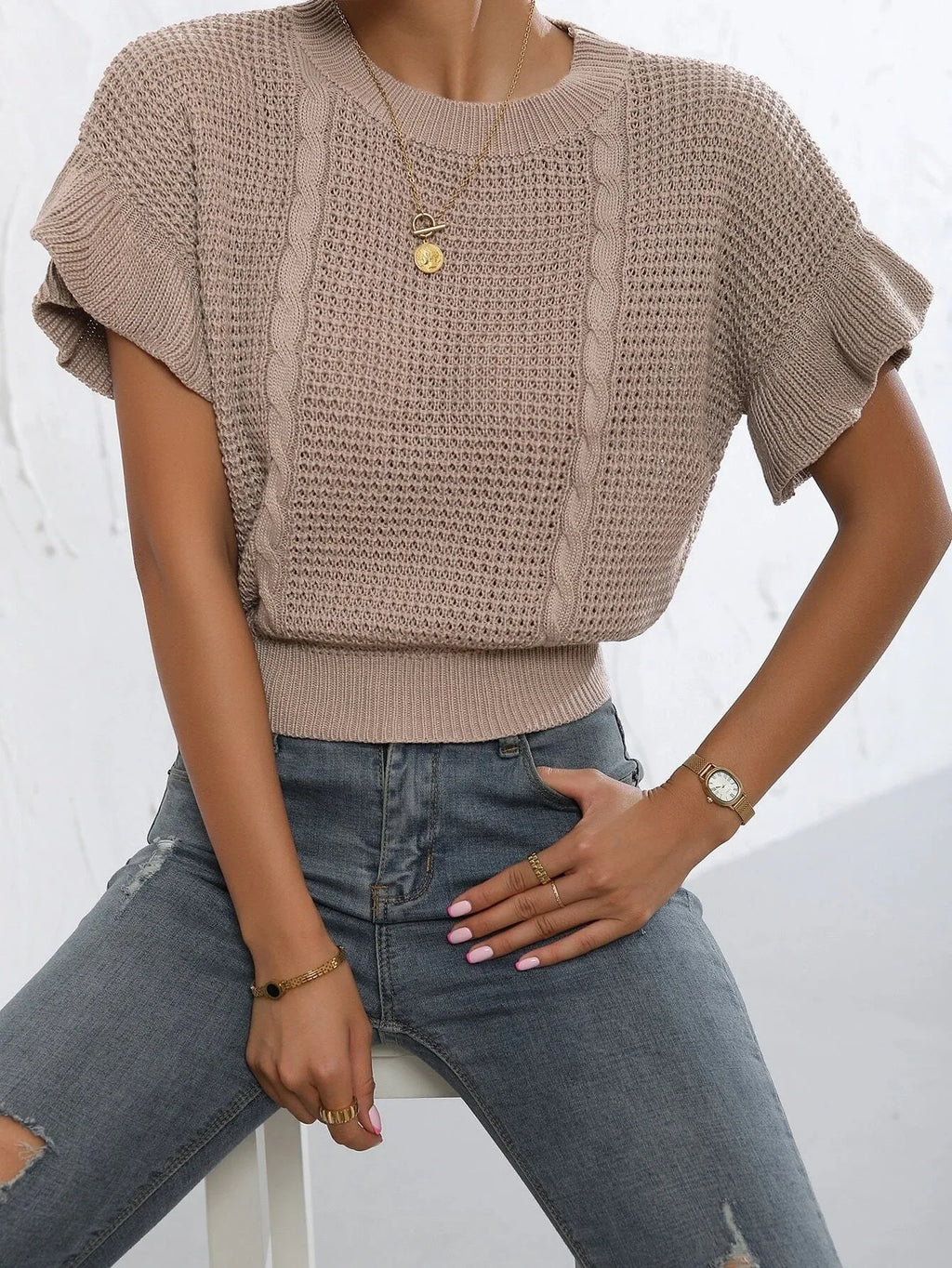 Knitted pullover sweater with twisted string ruffled short sleeves in polyester fabric