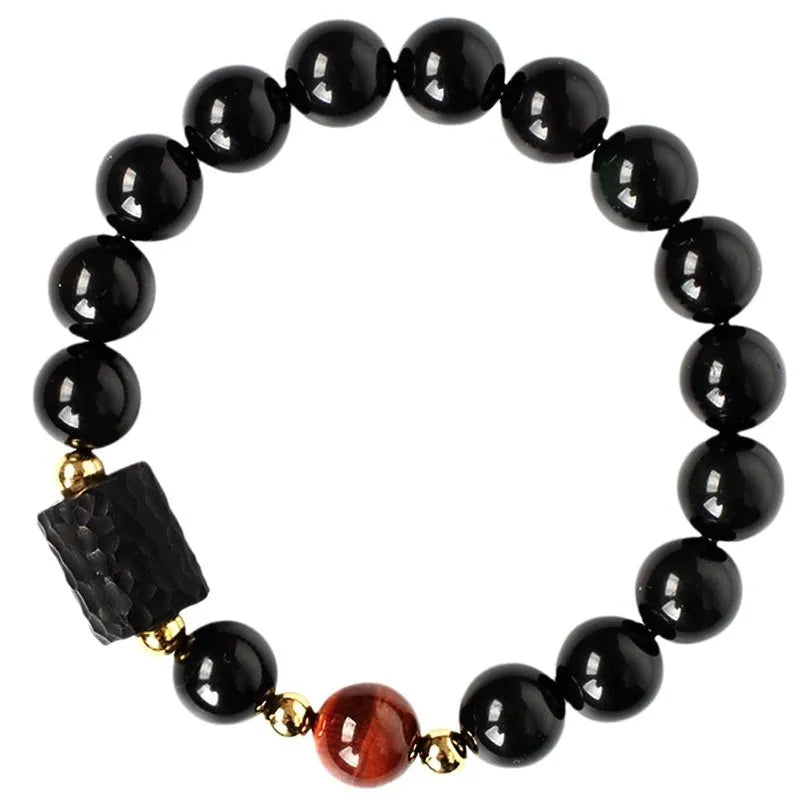 Handmade obsidian bracelet with red and yellow tiger eye beads in circle design