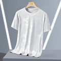 Plus size men's camouflage print short sleeve top in nylon fabric on a hanger.