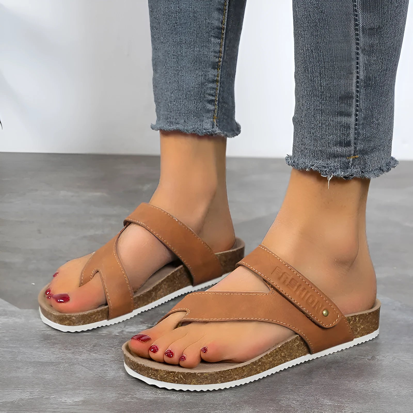 Women's blue flat toe ring thick-soled flip-flops with artificial PU upper on a plain background