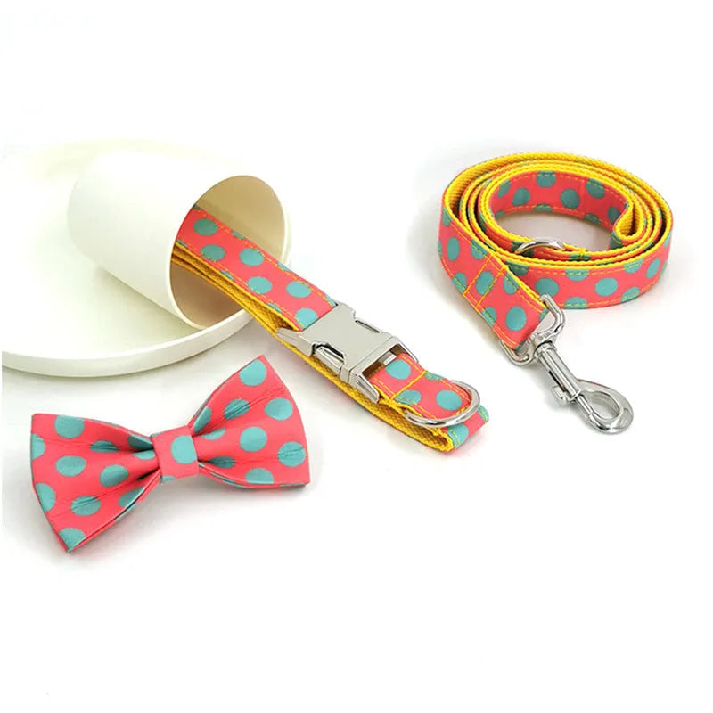 Yellow polka dot dog collar and matching lead rope set with a decorative bow.
