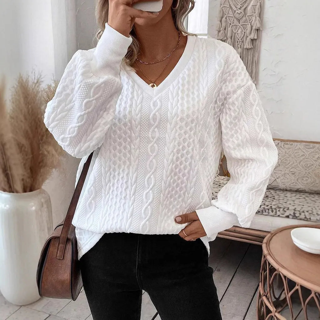 Milky white loose fit long sleeve T-shirt with a 3D pattern, casual pullover style.
