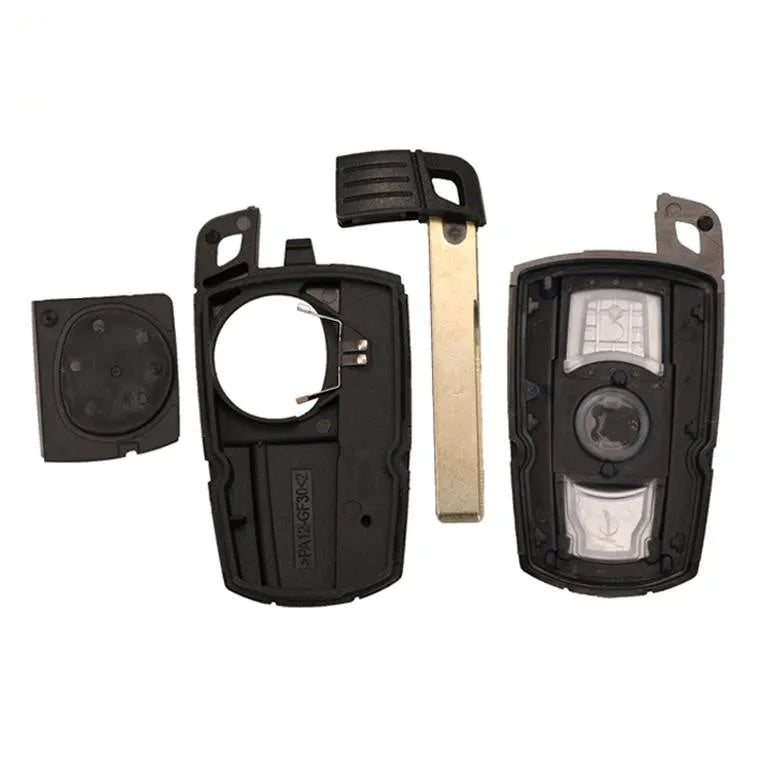 BMW CAS3 semi-intelligent three-button remote car key fob in metal and plastic.