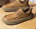 British retro style brown leather casual shoes with big toe design on a white background.