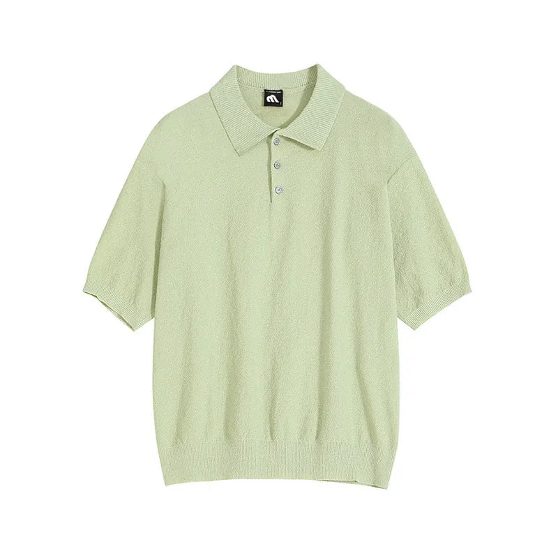 A caramel-colour men's retro knitted polo shirt with short sleeves, showing its loose fit and asymmetric design detail.