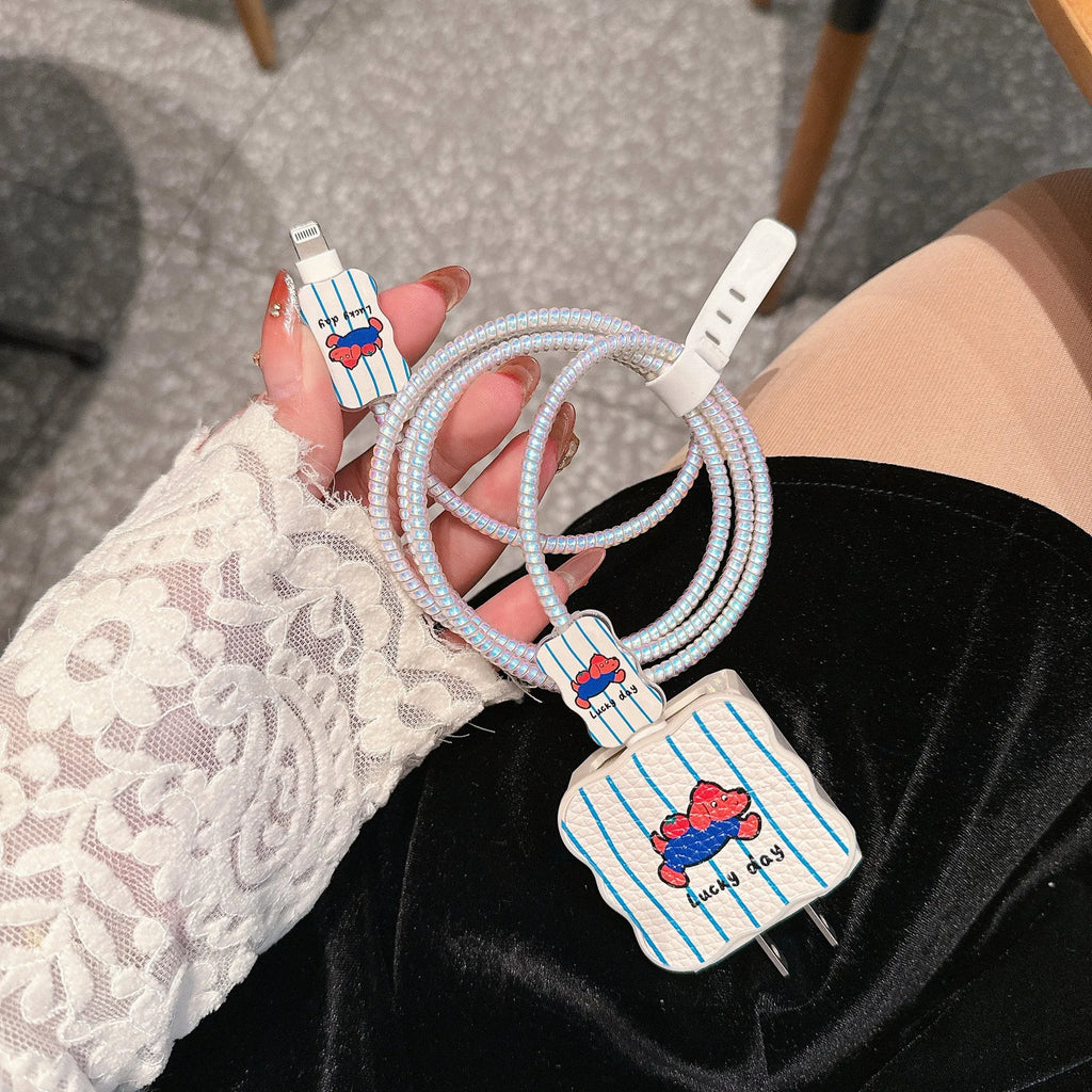 Set of four lambskin USB charger protection sleeves in cartoon puppy patterns for 18W 20W fast charging
