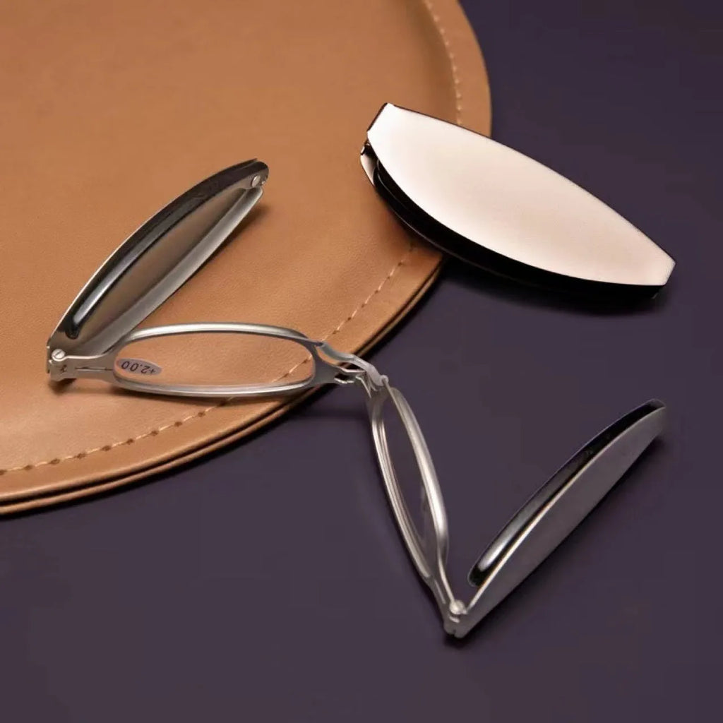 Folding presbyopic glasses with retro ring-frame in black and silver colours