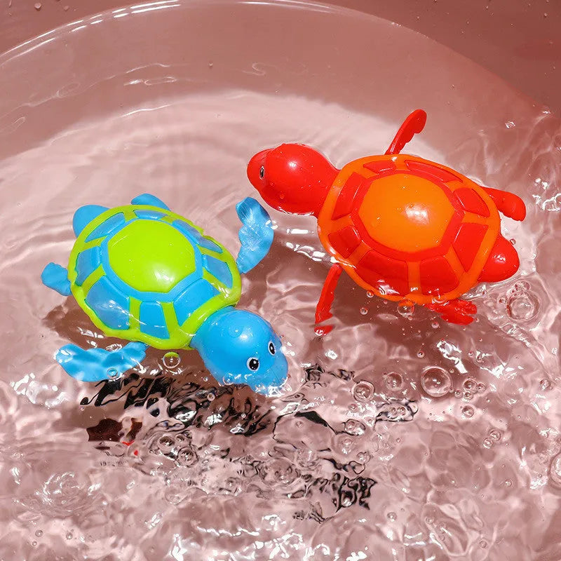 Plastic swimming turtle bath toy with brain game component for baby water play