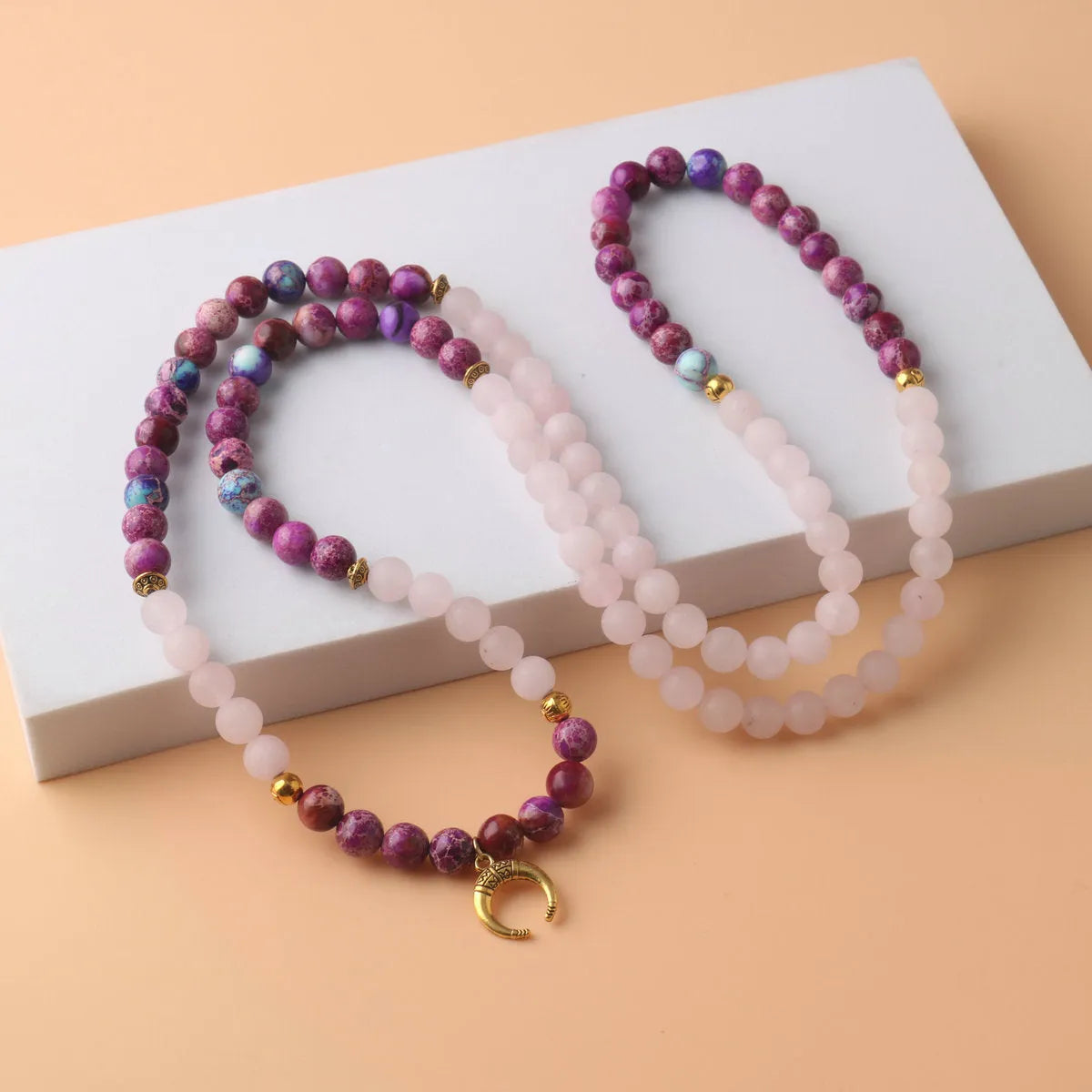 Pink crystal emperor stone round bead pendant necklace for casual unisex wear