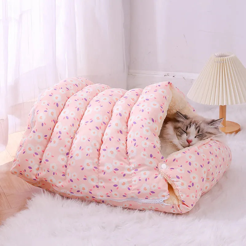 Enclosed winter cat bed with a removable cover in a floral pattern, shown in small and medium sizes.