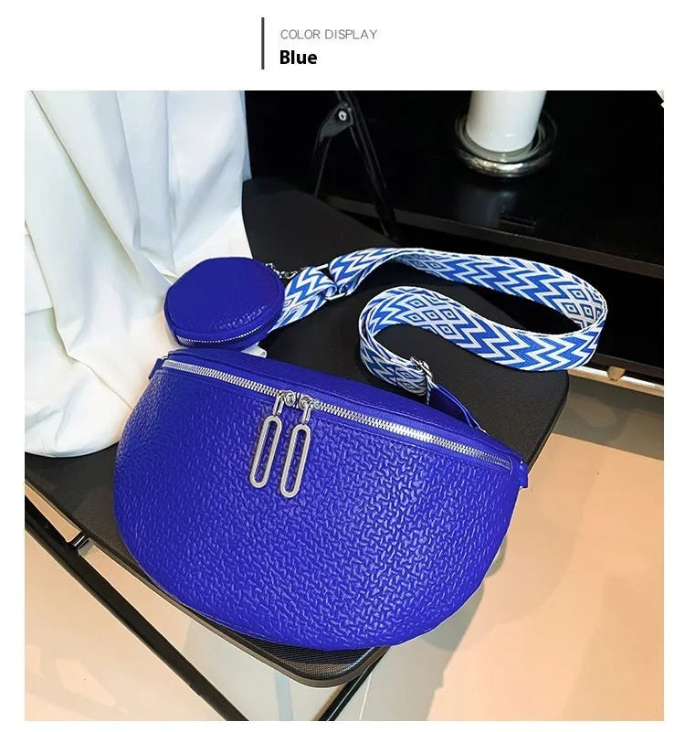 Women's solid colour textured PU crossbody bag with saddle lock hardware and clamshell opening