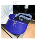 Women's solid colour textured PU crossbody bag with saddle lock hardware and clamshell opening
