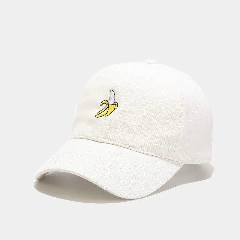 Adjustable baseball cap with cute banana embroidery in seven colour options on soft polyester fabric