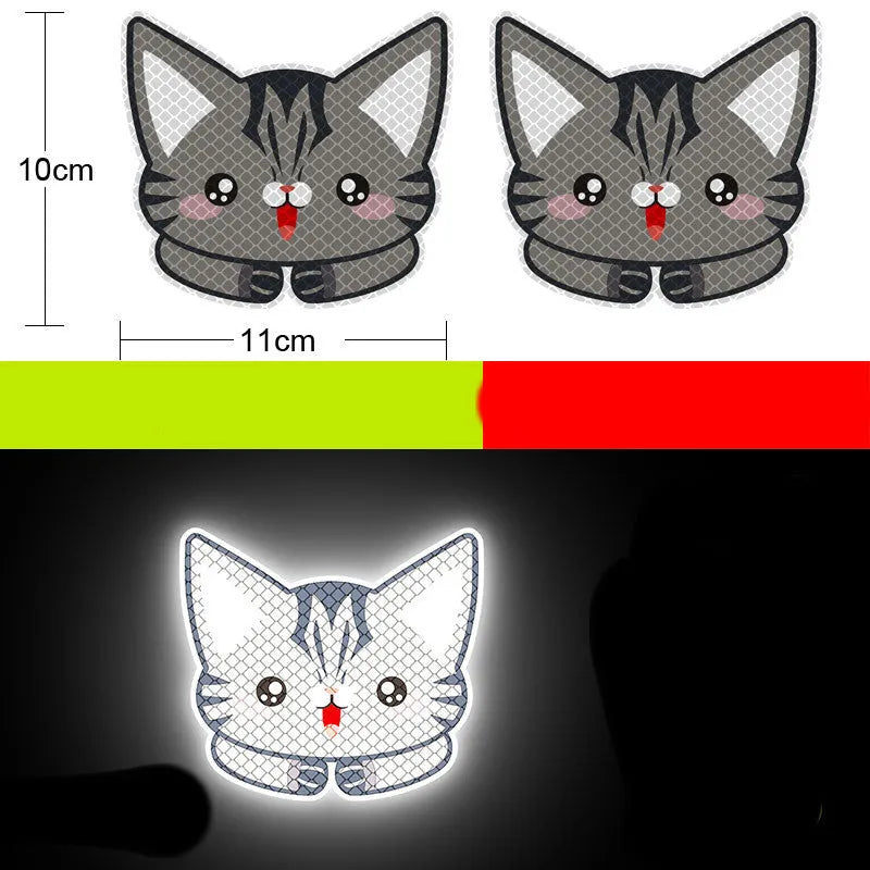 A pair of diamond-grade reflective warning stickers for vehicles, each measuring approximately 9 by 5 centimetres.