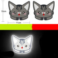 A pair of diamond-grade reflective warning stickers for vehicles, each measuring approximately 9 by 5 centimetres.