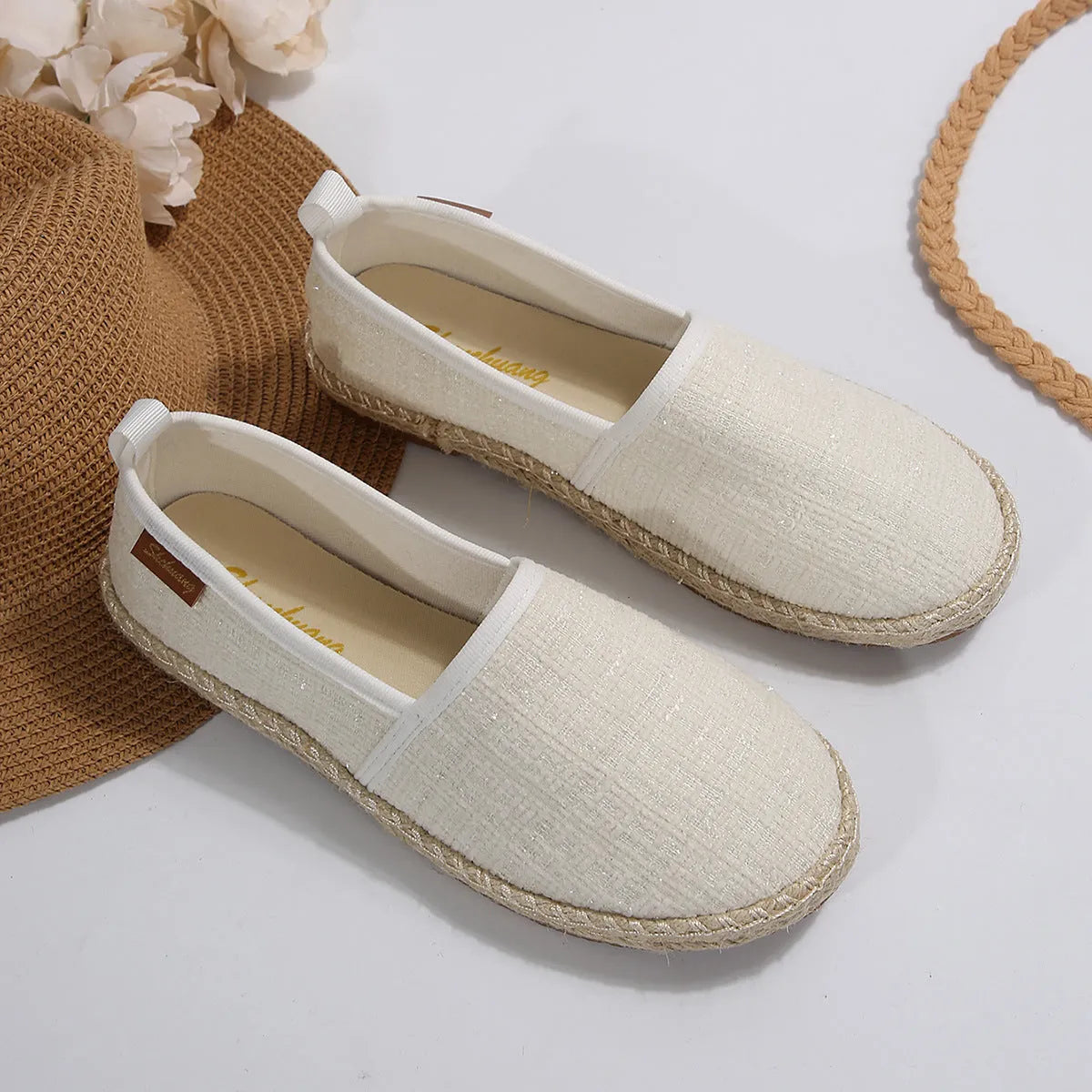 Casual fisherman shoes with canvas upper and rope bottom in beige colour