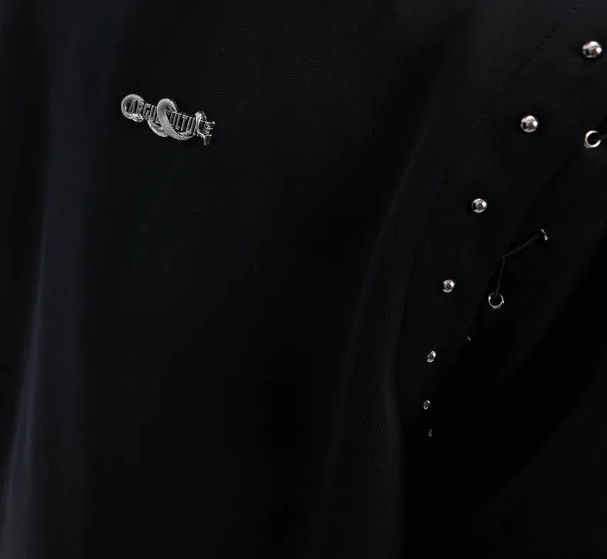 Deconstruction style short sleeve T-shirt with lace-up sides and cutout details in black or white.