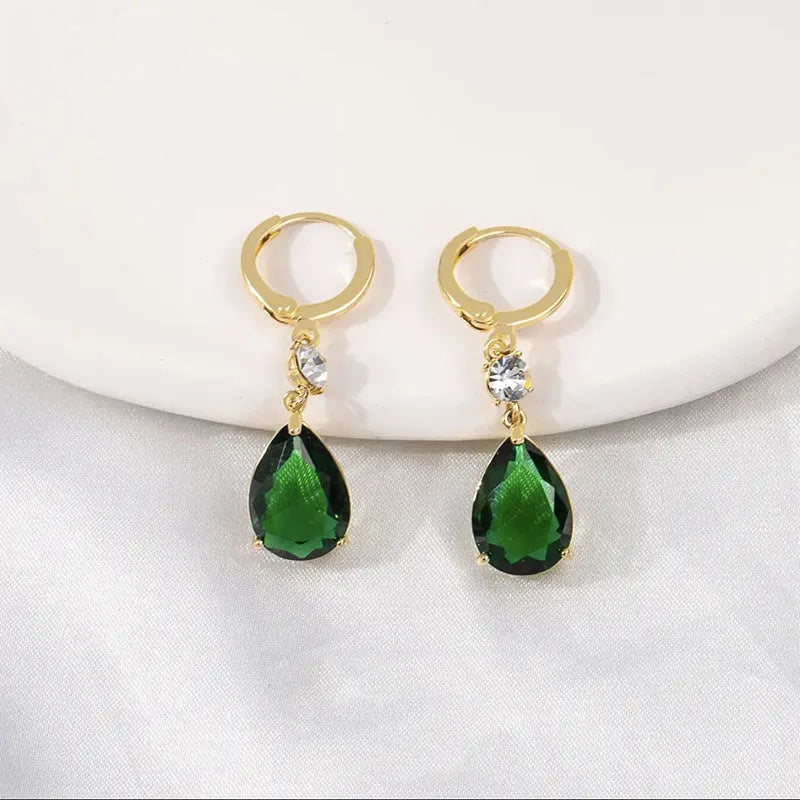 A single pair of green geometric teardrop-shaped alloy dangle earrings.