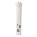 Closed and open views of cute cat paw design mini folding safety scissors on a craft background.