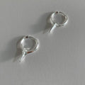 Geometric star-shaped ear clip earrings in platinum colour with copper construction