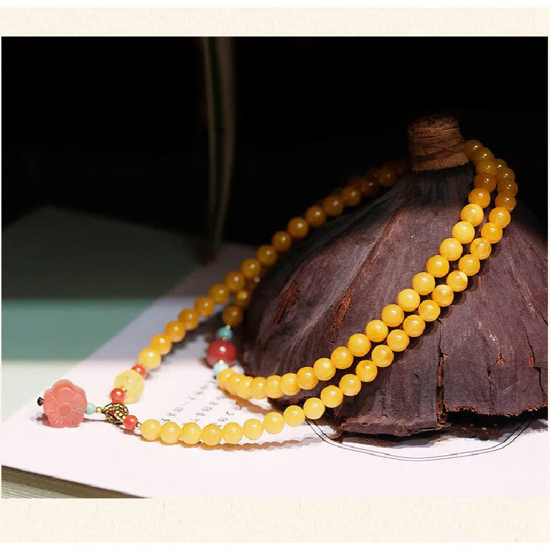Yellow amber bracelet with 5mm beads and animal zodiac design for women's retro style travel gifts