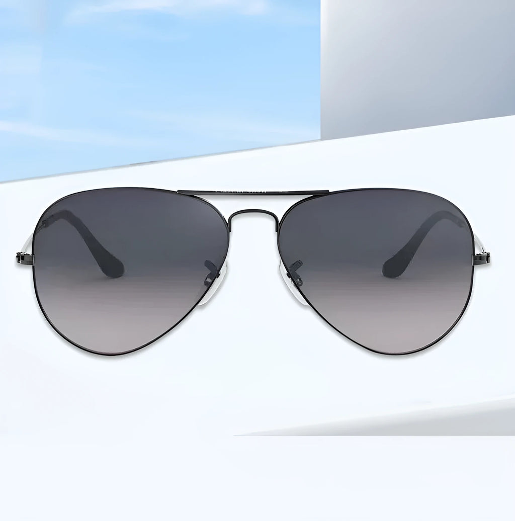 Tempered glass sunglasses with a choice of gold, silver, or black frames and dark green or blue gradient lenses.