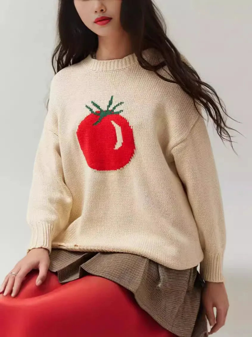 Women's milky white acrylic jacquard knit pullover sweater with a round neck and long sleeves.