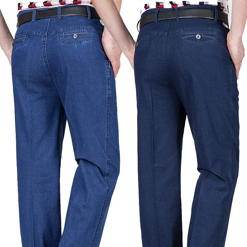 Men's high waist loose fit blue denim jeans on a neutral background