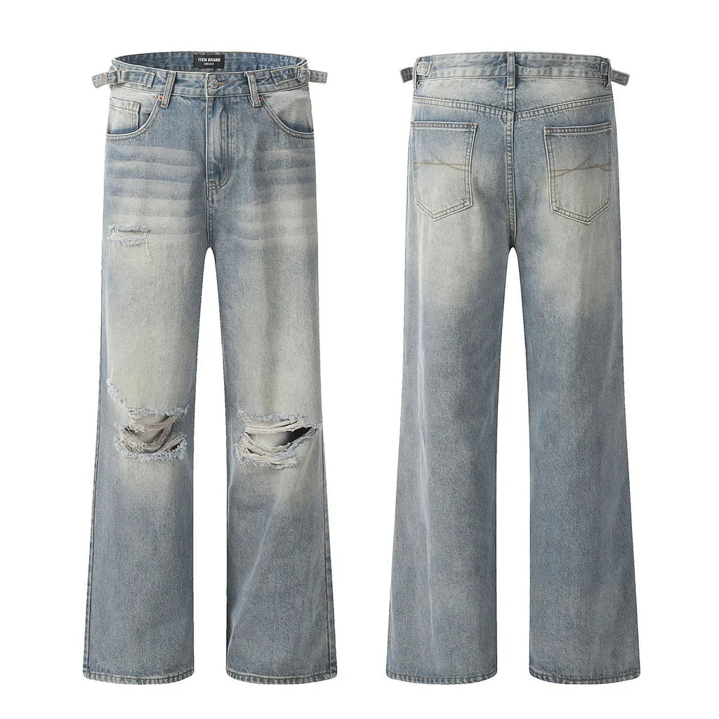 Blue retro-style men's straight-leg jeans with distressed detailing on a solid background