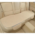 Linen car seat cushion with plaid pattern and hemmed edges in classic black and red colour