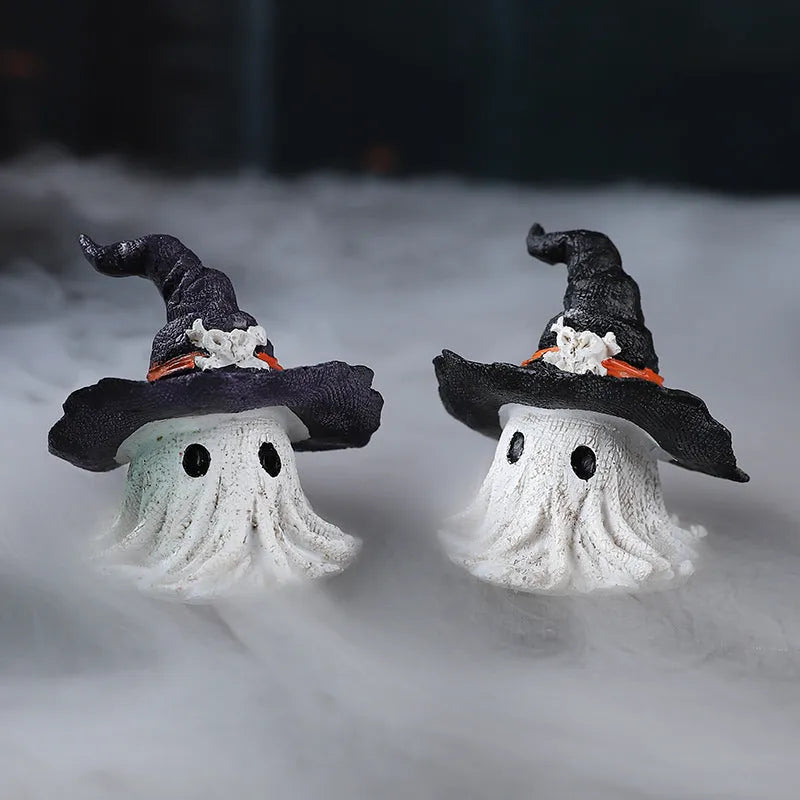 Purple and black resin wizard hat Halloween ghost ornament for holiday decorating.