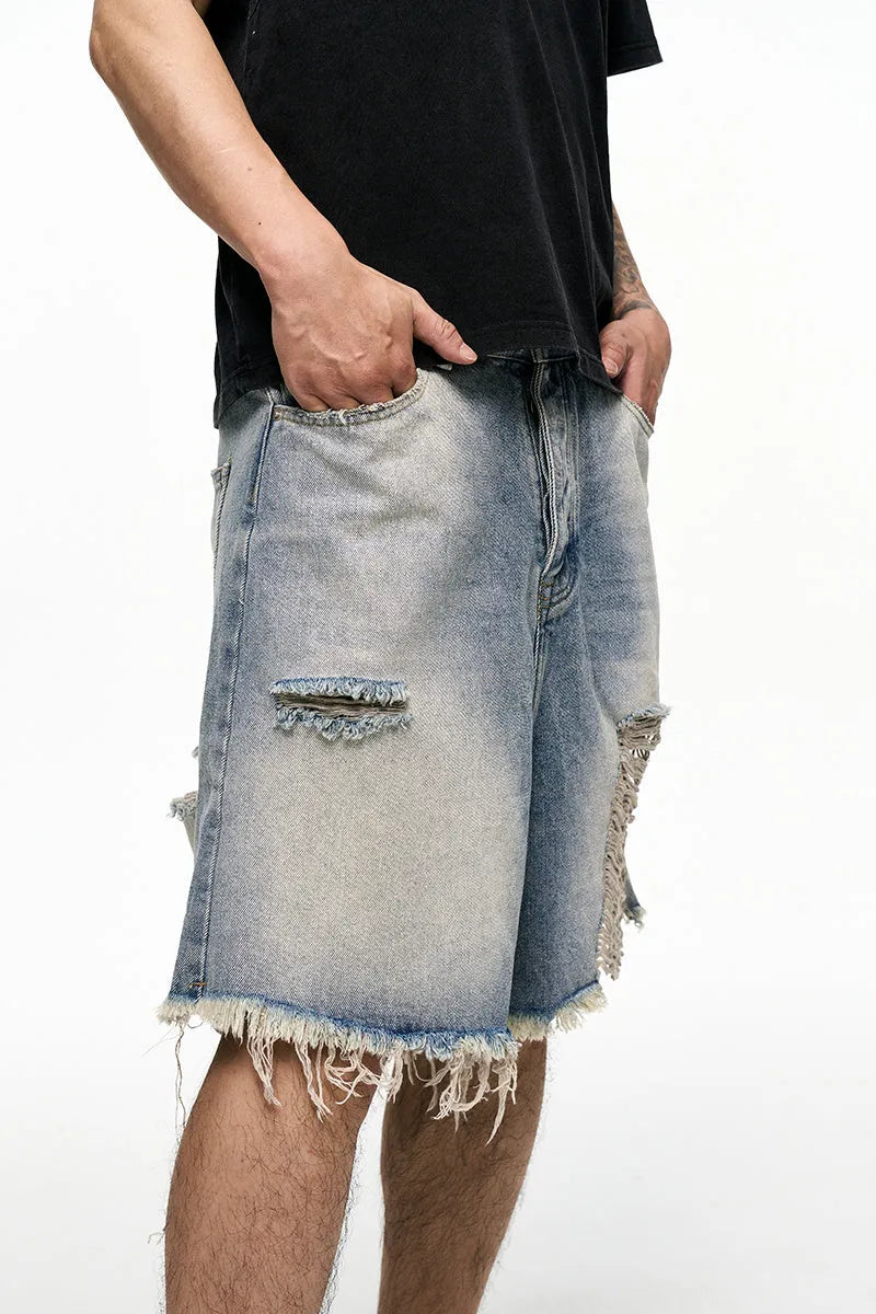 Light blue men's baggy denim shorts with wide leg cut and retro washed finish