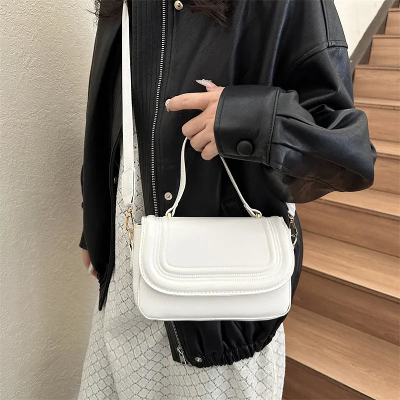 Women's casual PU one-shoulder crossbody bag in black with urban simplicity sewing line detail and sandwich pocket