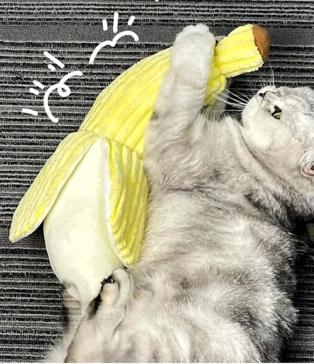 Yellow banana-shaped plush cat toy with crinkle sound feature for chewing and kicking