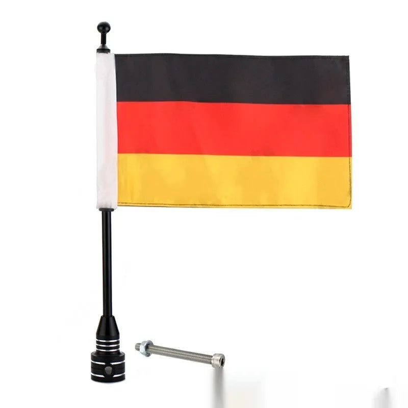 Motorcycle luggage rack flagpole accessory in black and silver finishes mounted on tail box