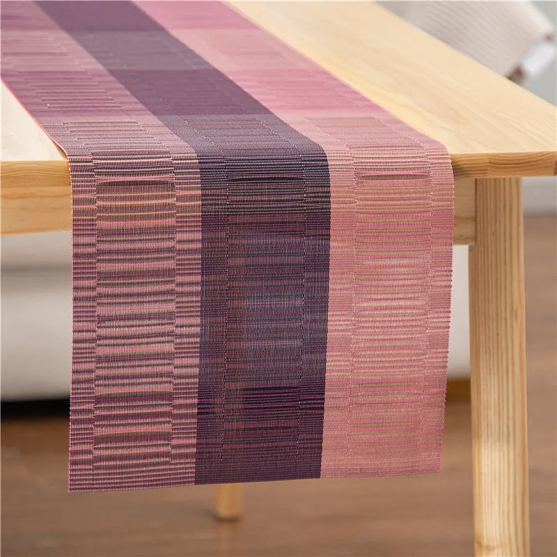 PVC non-slip dish mat in gradient bamboo black colour on a kitchen countertop.