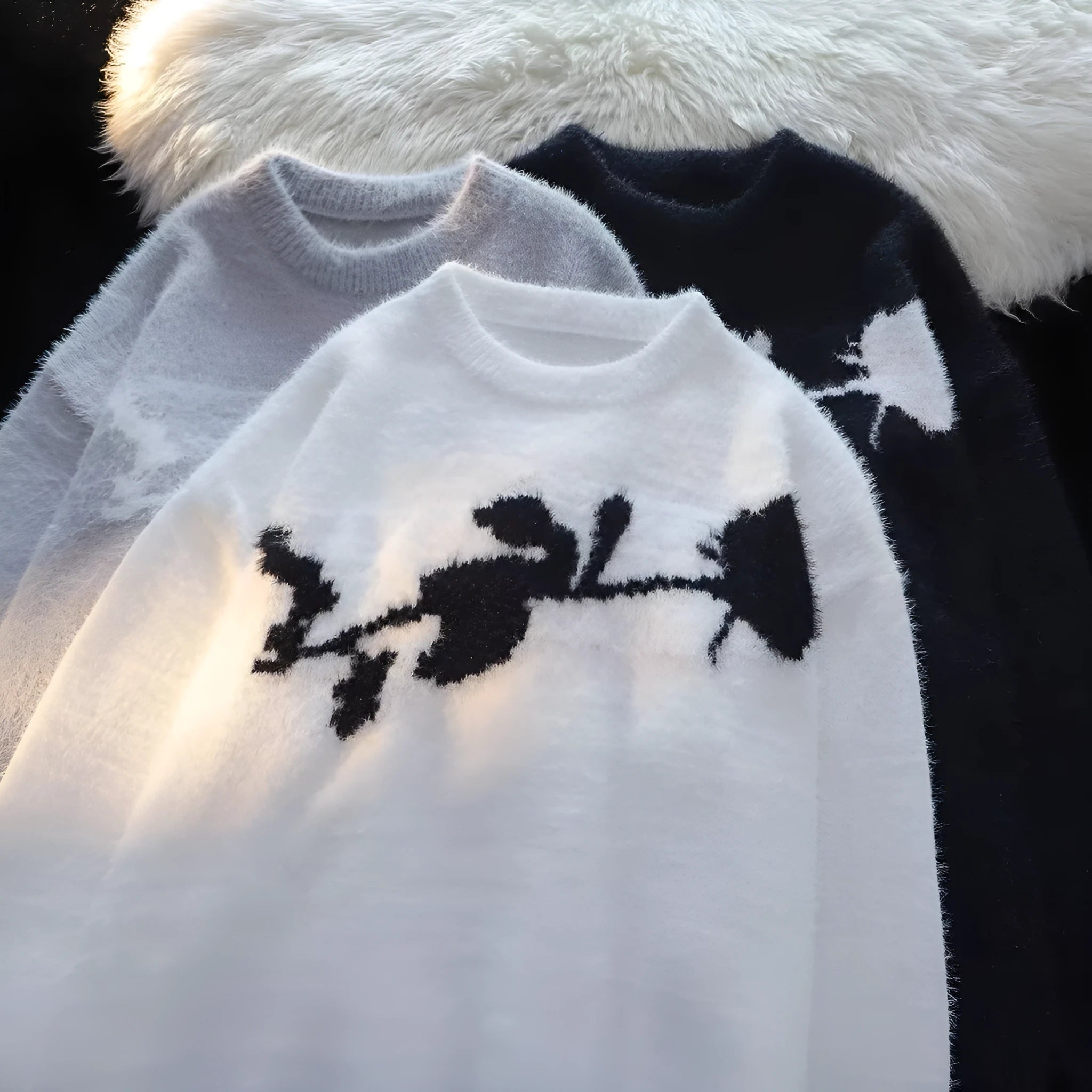 Men's black pullover sweater with a detailed flocking horse graphic in an American dark rose design.