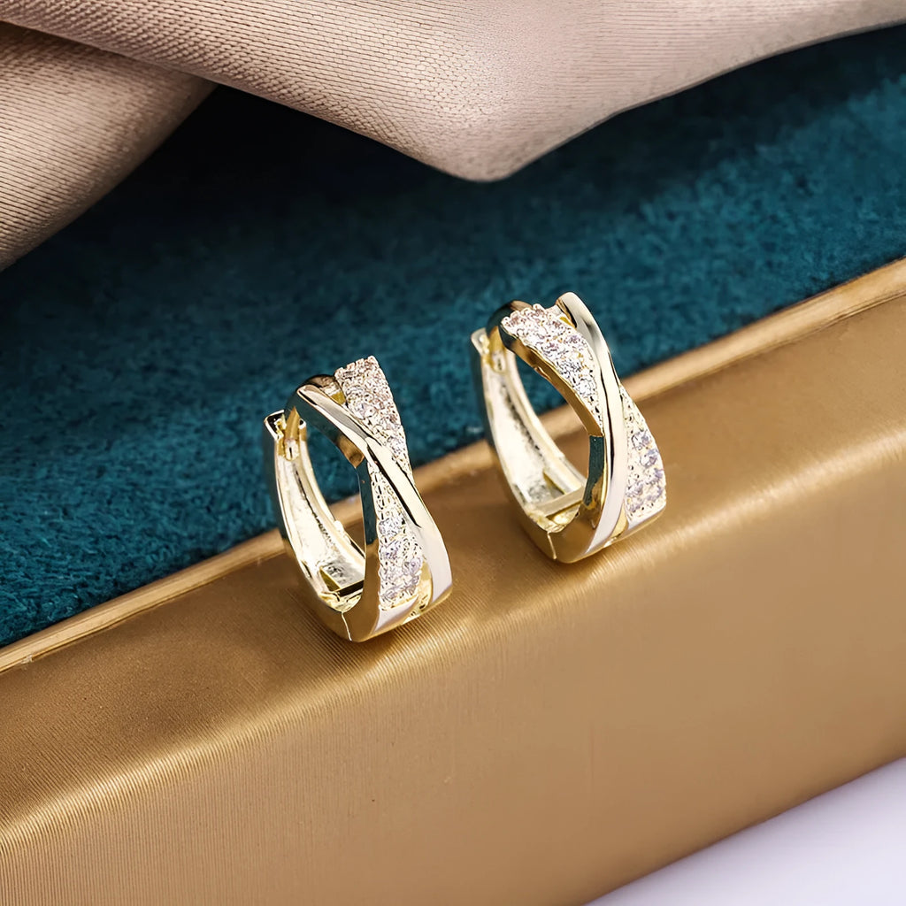 Geometric copper drop earrings with zircon stones in 14K yellow finish