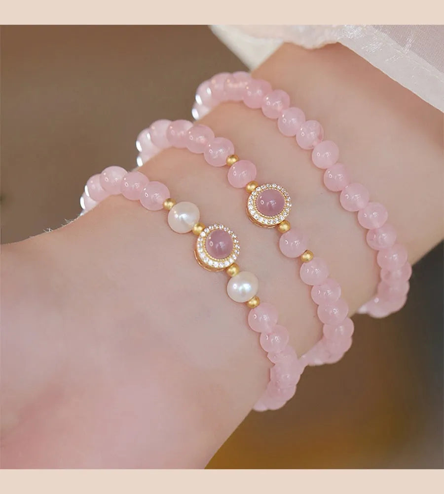Ladies copper bracelet with Taoji pink crystal beads in natural style on display