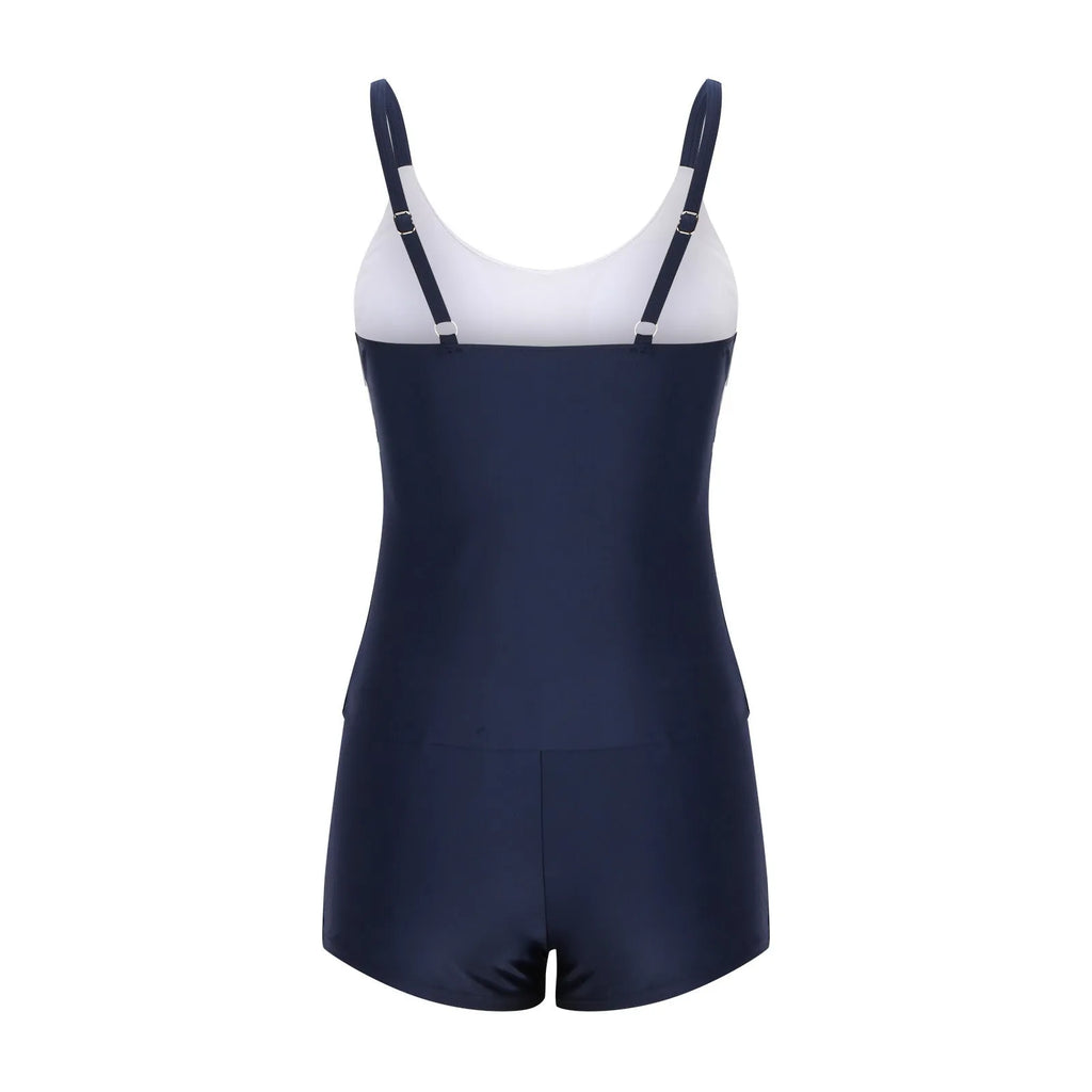 Women's conservative stripe bikini with boyshort shorts and split-front top on a mannequin.