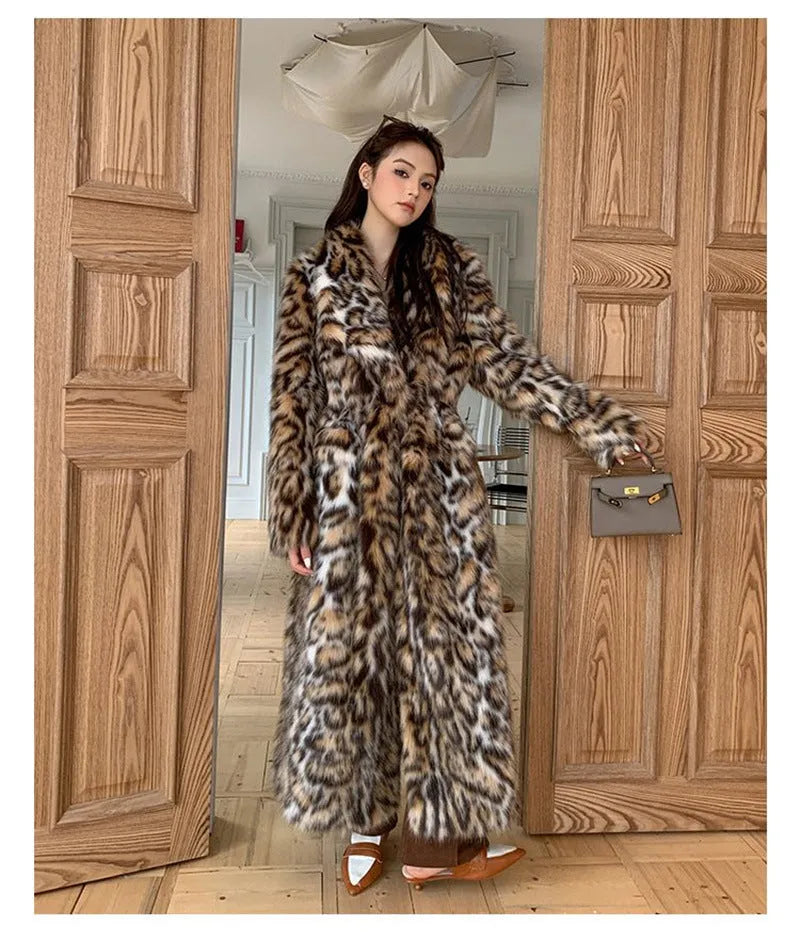 Faux fur coat with detachable collar in street fashion style showing long length and practical pockets