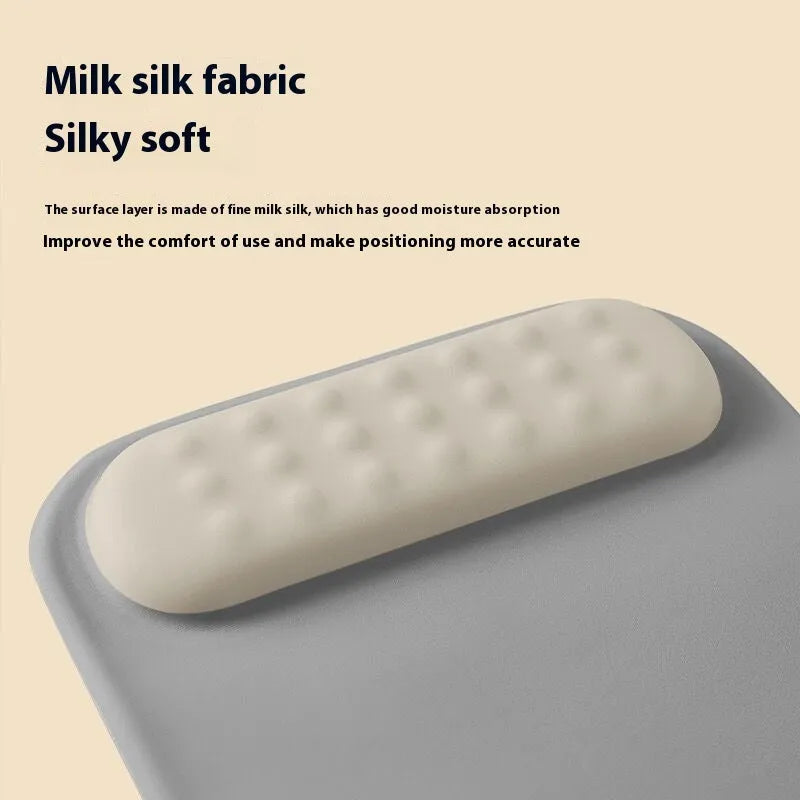 Ergonomic cloth silicone mouse pad with integrated wrist rest in multiple colour options.