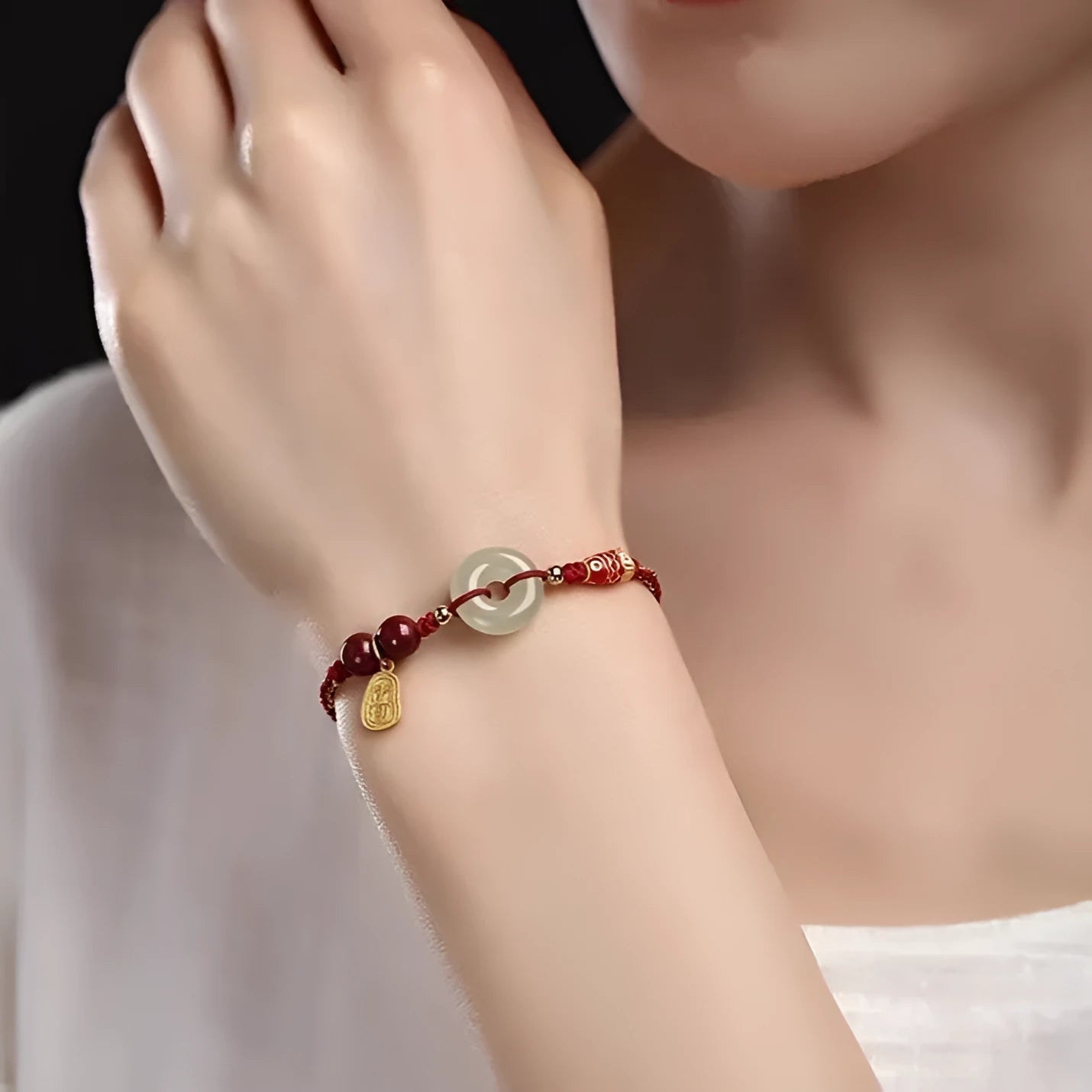 Hetian jade peace buckle bracelet showing 10mm geometric stones on braided rope with adjustable design