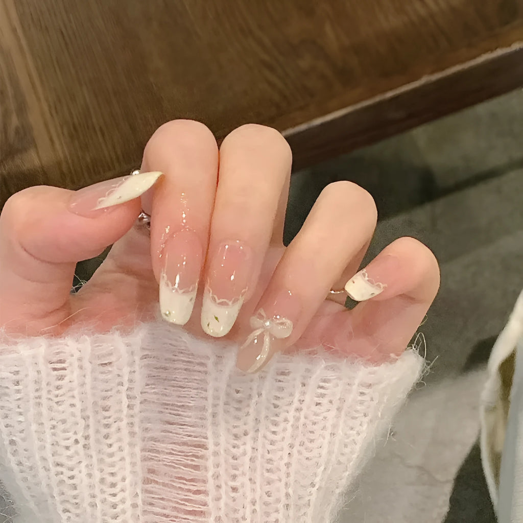 A selection of false nails in various colours and sweet girl style patterns, shown in packs of 5, 10, or 15 sets.