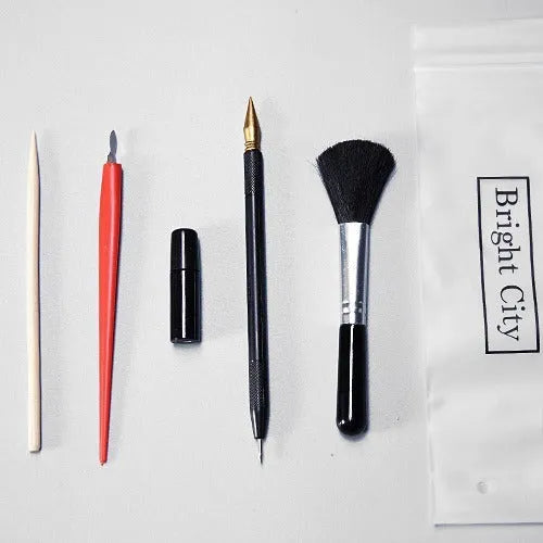 Scraping painting tools set with white card, healing pens, and log photo frame