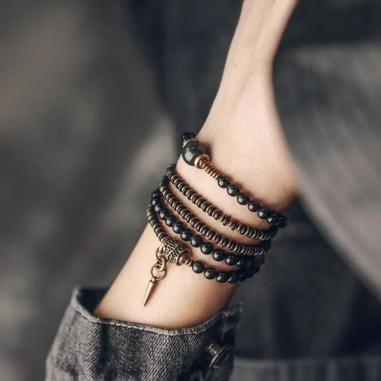 Black geometric beaded bracelet with multi-layered retro design