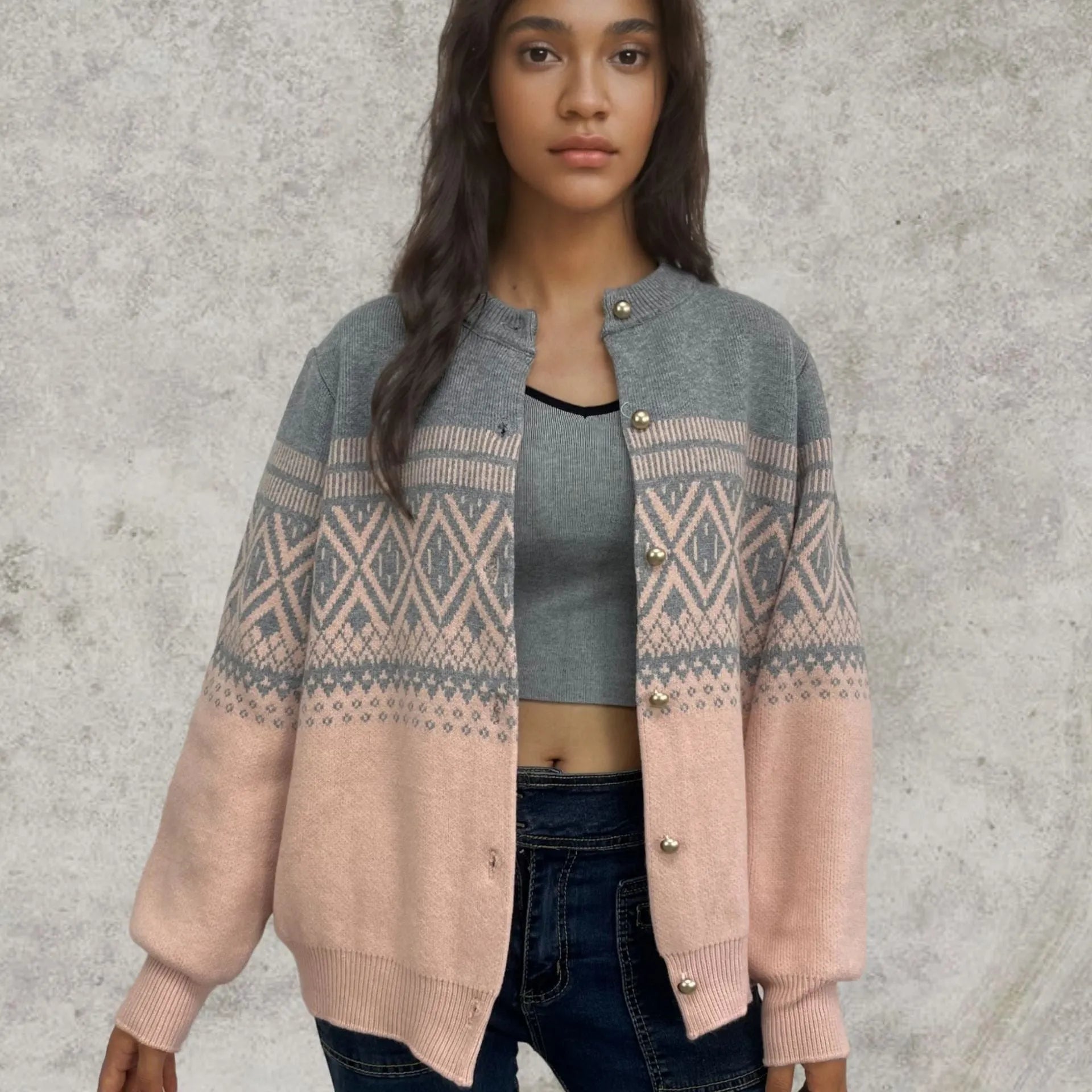 Women's grey alpaca wool cardigan with pink and white diamond pattern and long sleeves